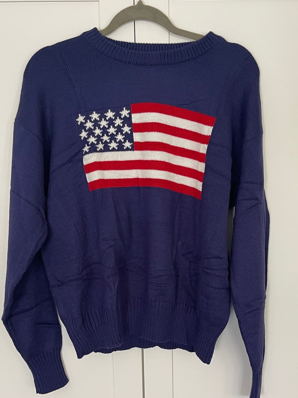 Crazigoods Navy Acrylic Sweater with Red & White Flag Detail. Never worn